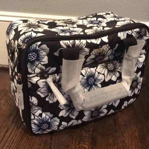 kate spade Handbags - Kate Spade Ridge Street Scottie train bag (floral) kate spade Handbags - Kate Spade Ridge Street Scottie train bag (floral)